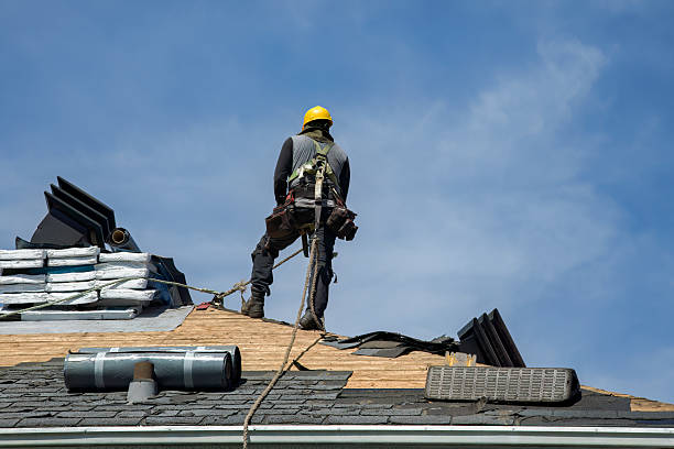 Professional Roofing technician working in Kents Store, VA